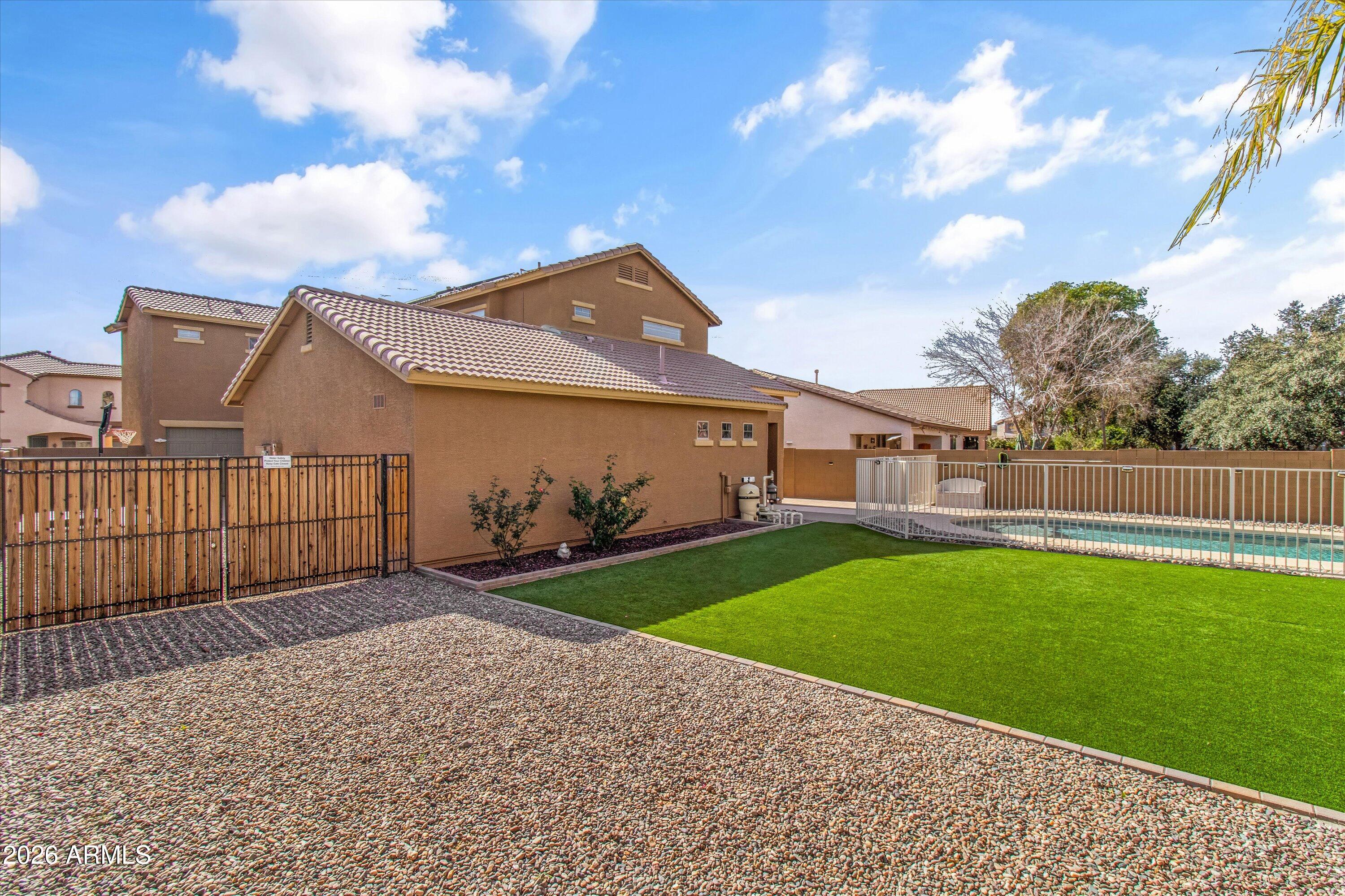 16510 West Tether Trail Surprise, AZ 85387 - Photo 7 of 47 a view of a porch with a yard