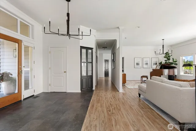a view of a living room and hardwood floor