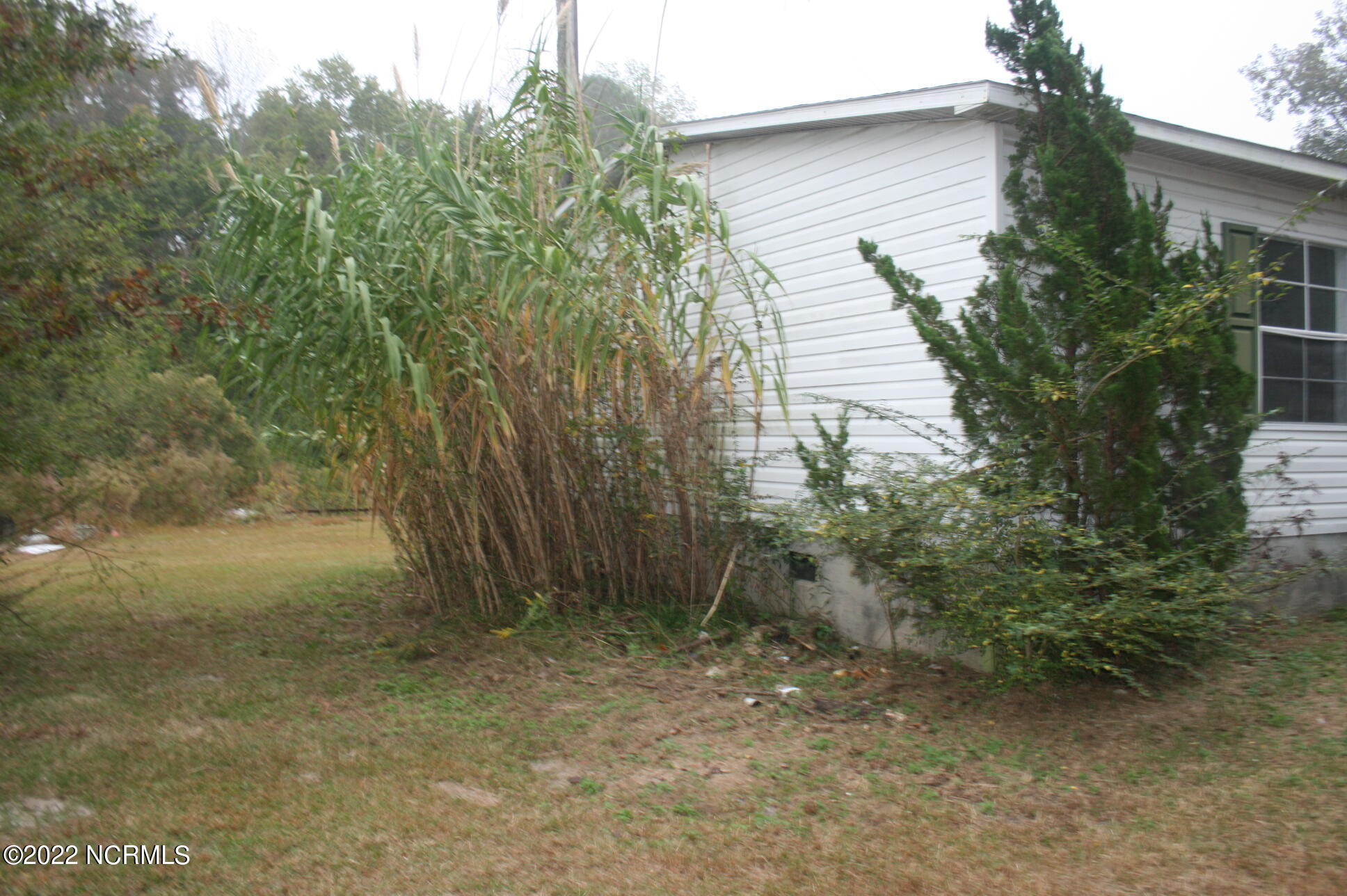 321 Harris Creek Loop Road Jacksonville, NC 28540 - Photo 14 of 17 left side
