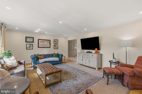 a bed room with a bed and a television