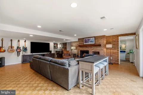 a spacious bedroom with a bed and a book shelf