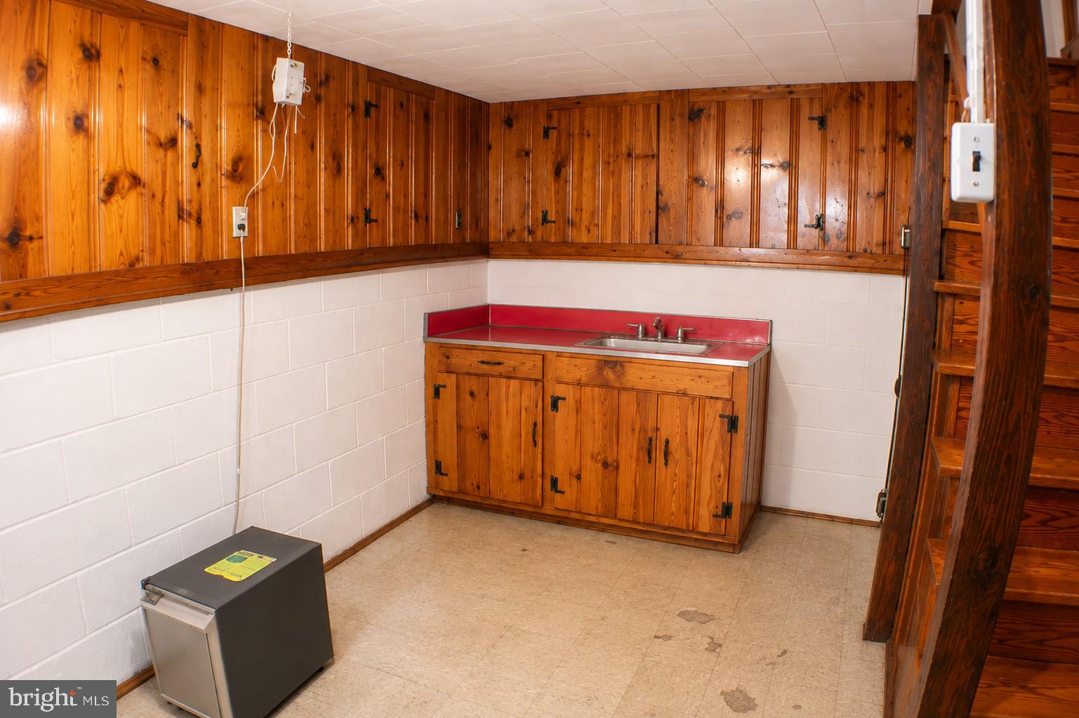 4502 Maple Road Suitland, MD 20746 - Photo 21 of 40 Cozy basement with rustic charm.