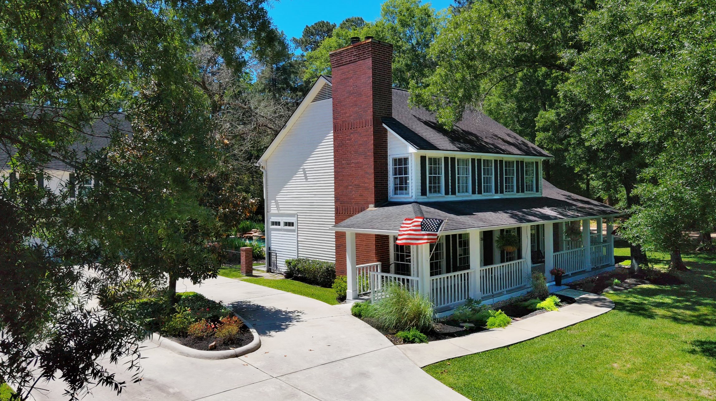 36 Wind River Drive Conroe, TX 77384 - Photo 2 of 45 Imagine the joy of returning each day to this exquisitely crafted and charming residence; it's more than just a house; it's a home.