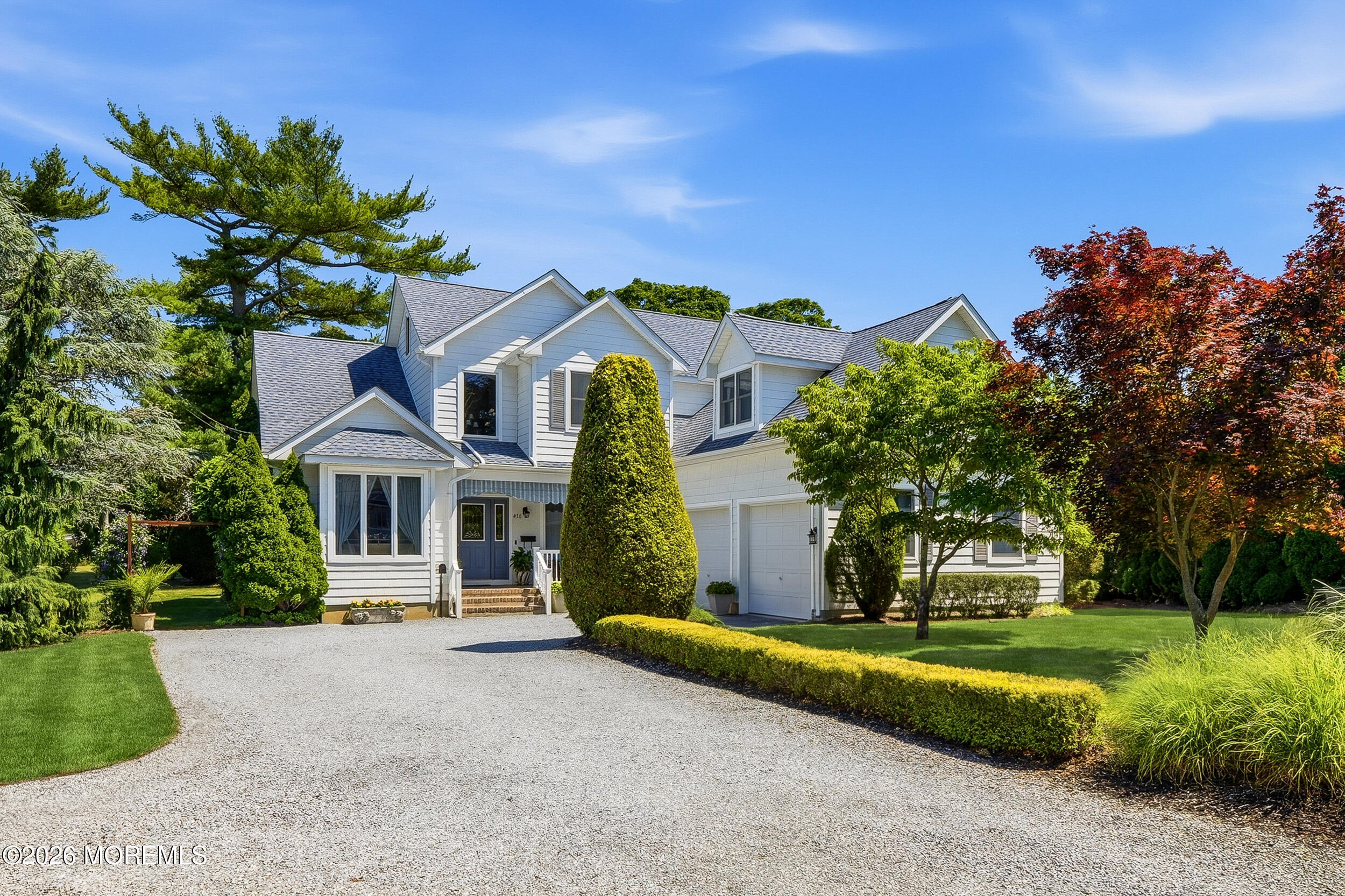 478 Rickey Lane Long Branch, NJ 07740 - Photo 13 of 64 a front view of a house with a yard