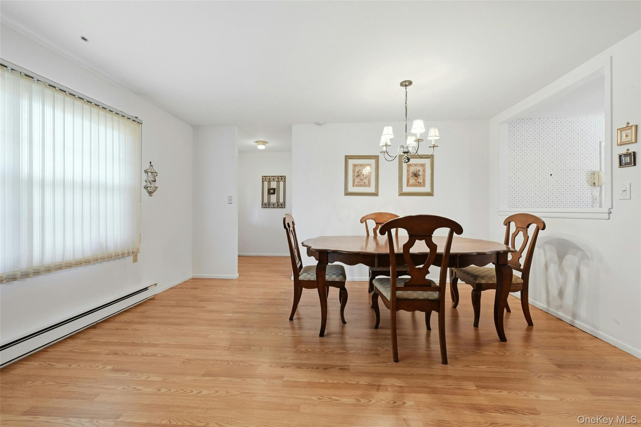 128 D Exmore Court Ridge, NY 11961 - Photo 11 of 45 Large Open Living Room & Dining Room.
