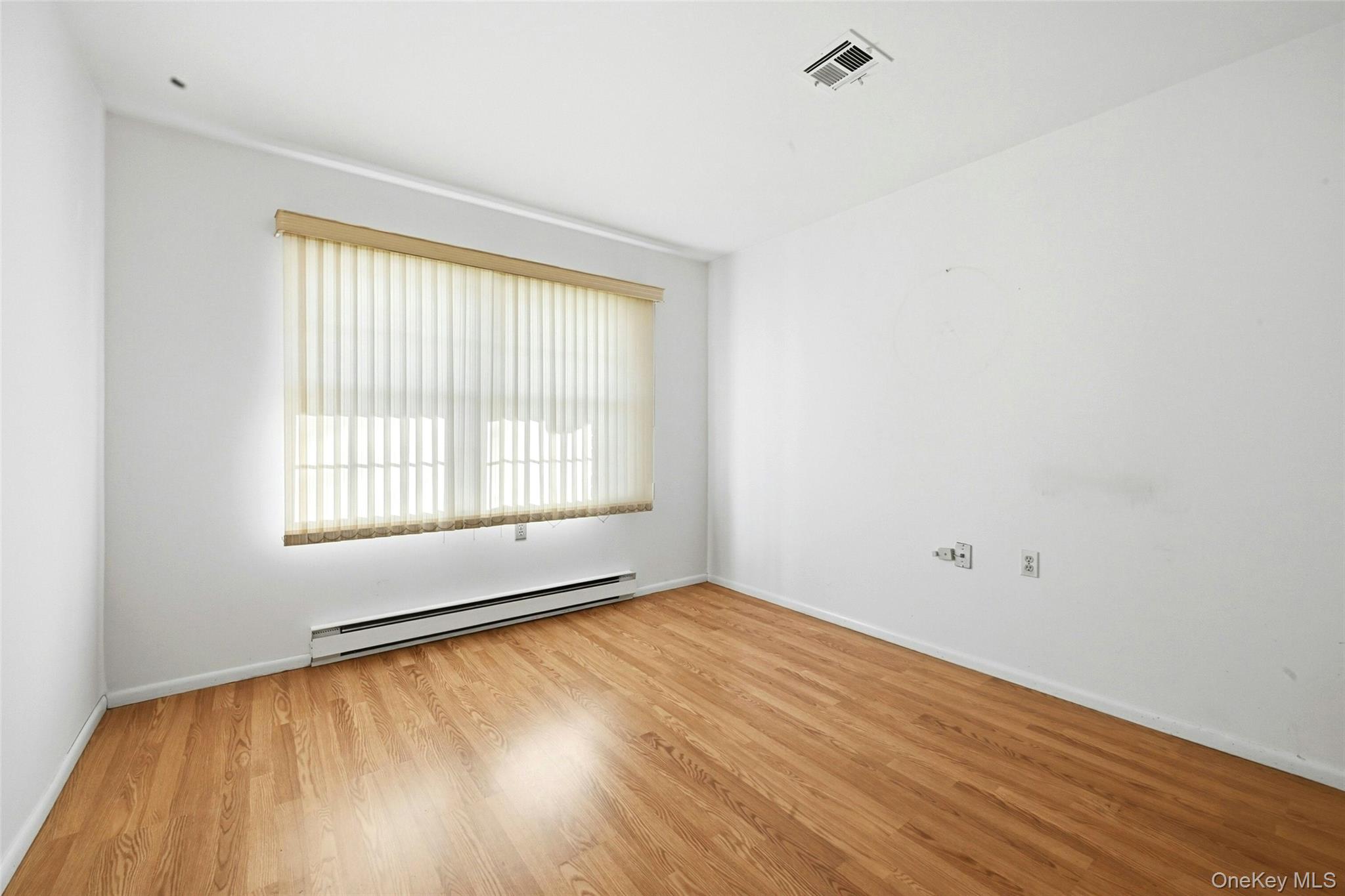 128 D Exmore Court Ridge, NY 11961 - Photo 19 of 45 Guest Bedroom.
