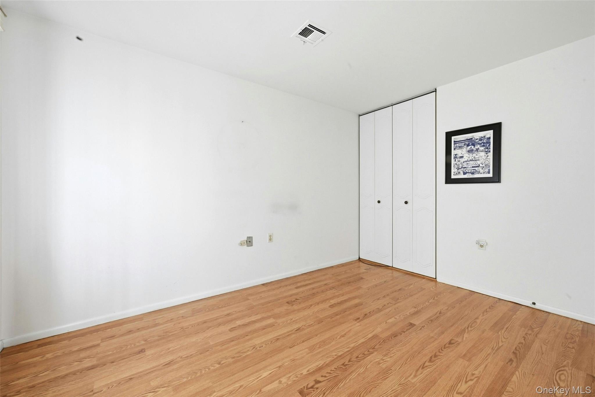 128 D Exmore Court Ridge, NY 11961 - Photo 20 of 45 Guest Bedroom