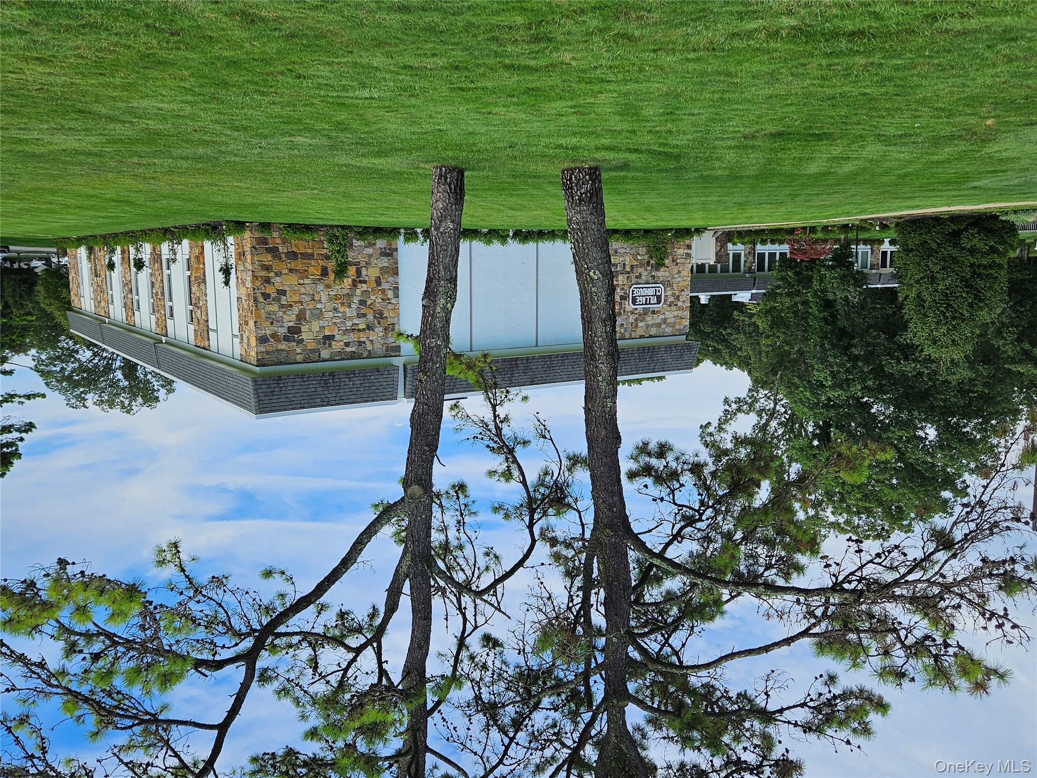 128 D Exmore Court Ridge, NY 11961 - Photo 35 of 45 The Spectacular Leisure Village Clubhouse Hosts Many Clubs & Community Events Including: Bocce, Bridge, Yoga, Mahjongg, Gym/Exercise, Billiards And More!