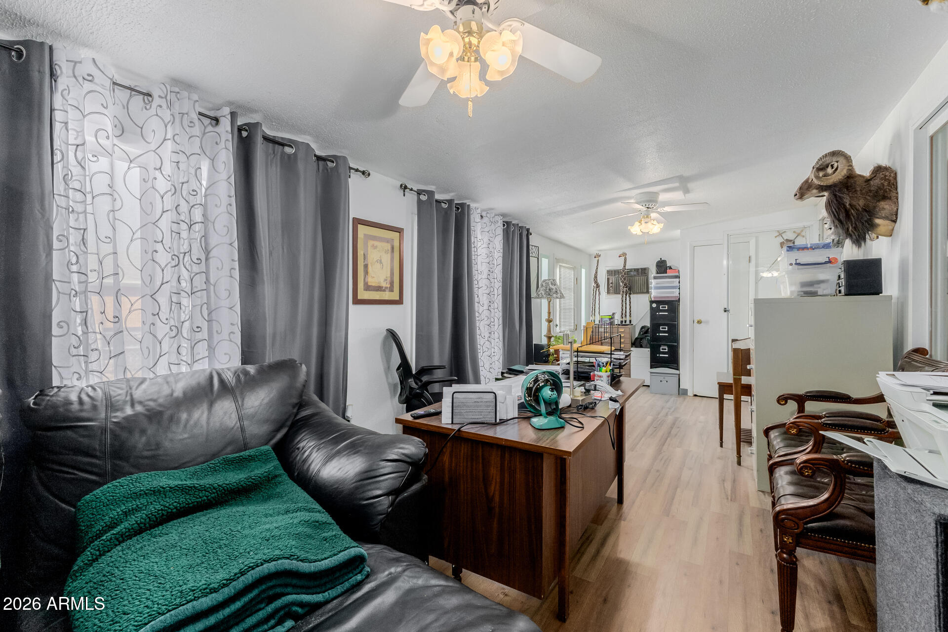 420 West 6th Street Ajo, AZ 85321 - Photo 18 of 35 a living room with furniture and a large window