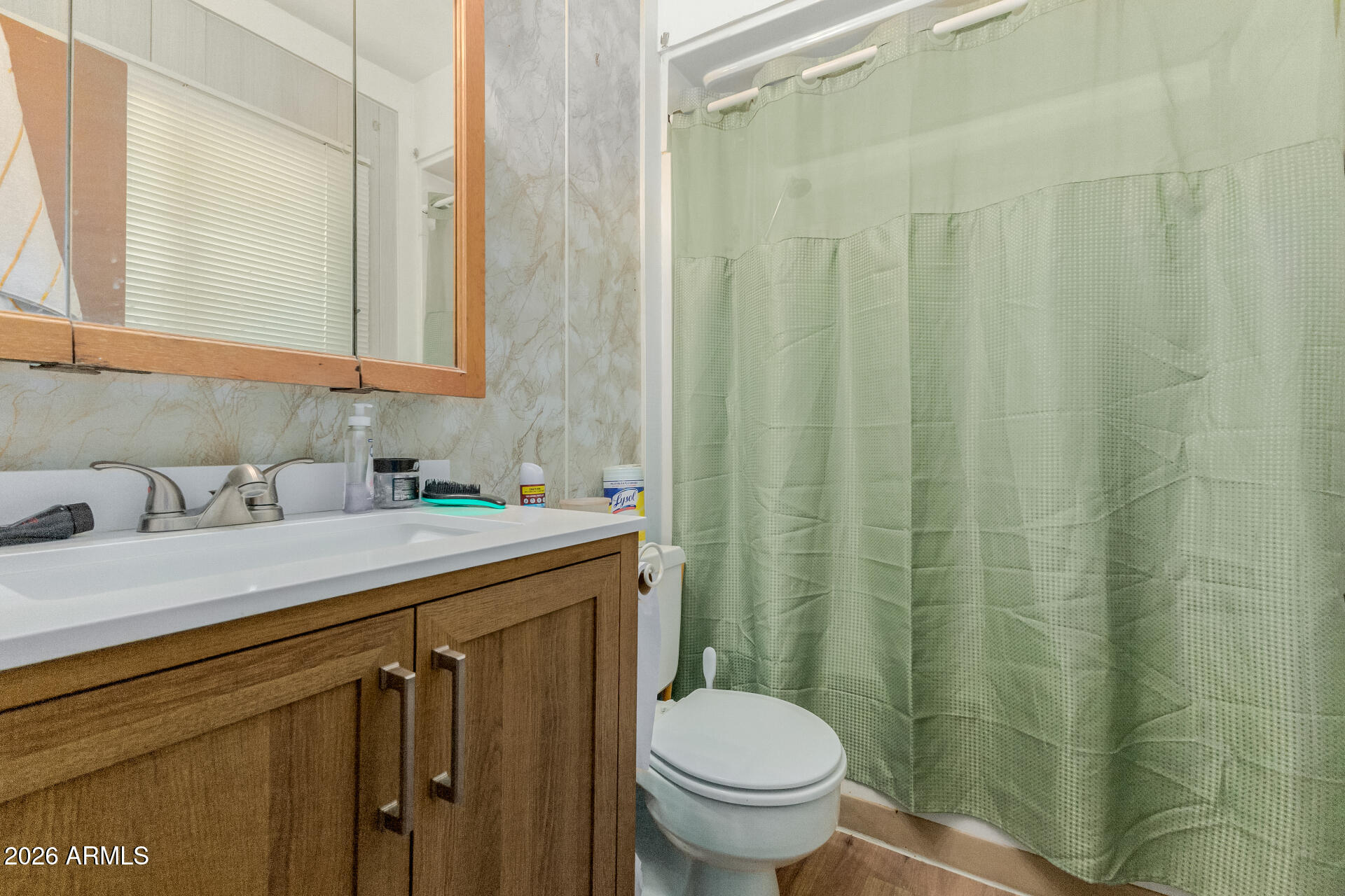 420 West 6th Street Ajo, AZ 85321 - Photo 22 of 35 a bathroom with a sink a toilet and a mirror