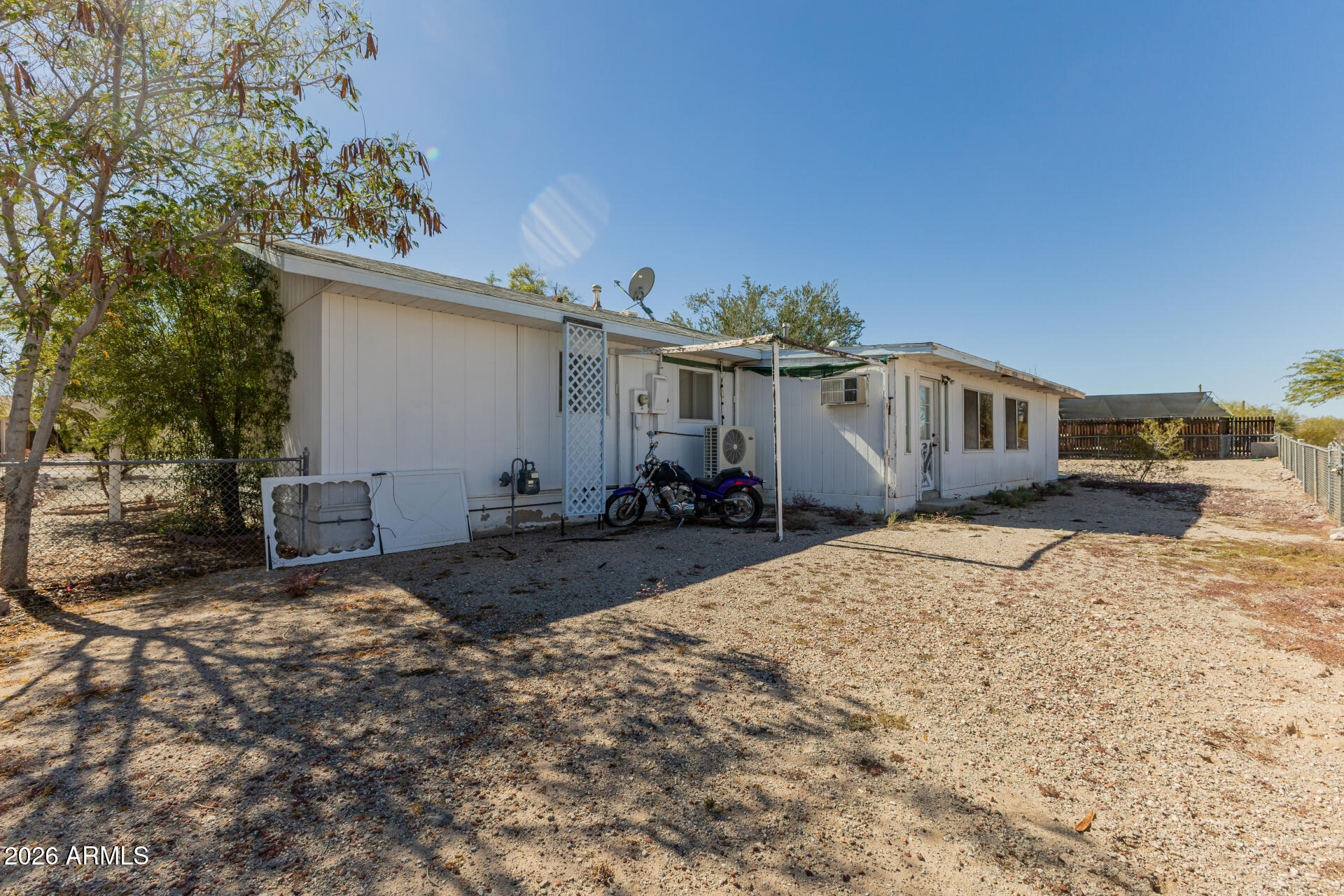 420 West 6th Street Ajo, AZ 85321 - Photo 29 of 35 a view of a house with backyard and trees