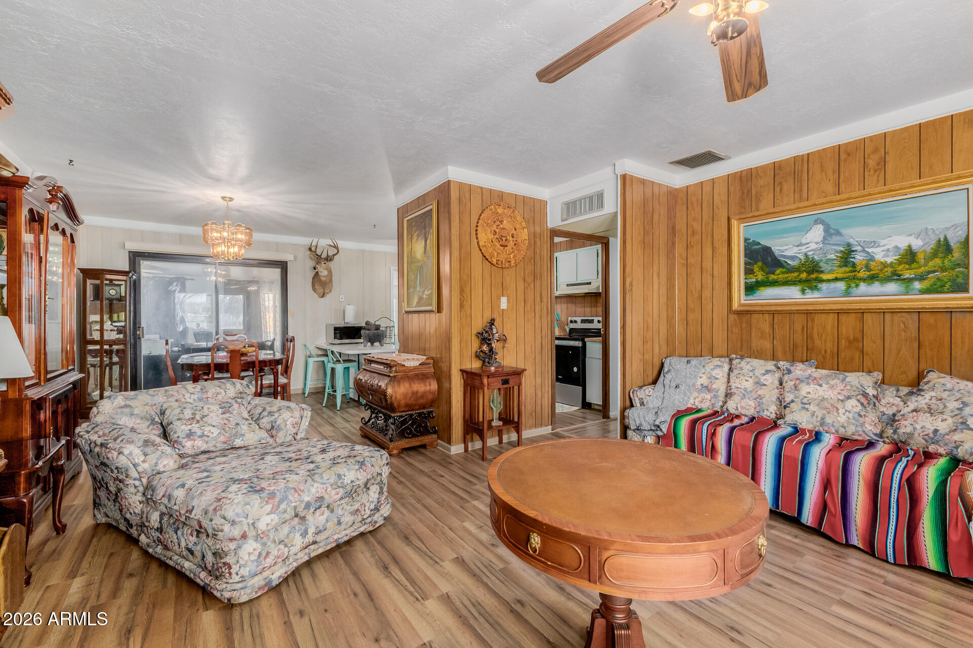 420 West 6th Street Ajo, AZ 85321 - Photo 6 of 35 a living room with furniture and a wooden floor