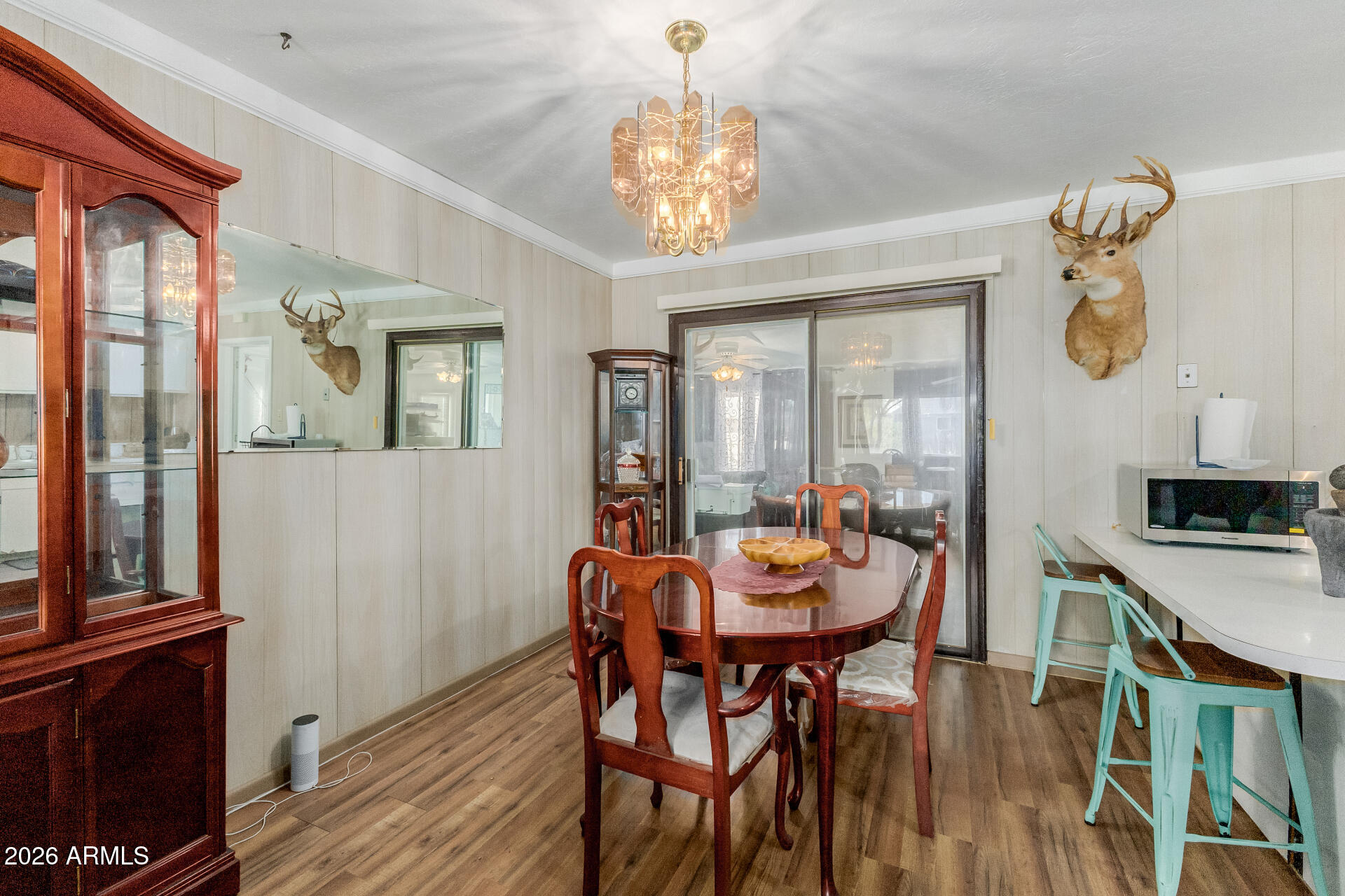 420 West 6th Street Ajo, AZ 85321 - Photo 8 of 35 a view of a dining room with furniture window and wooden floor