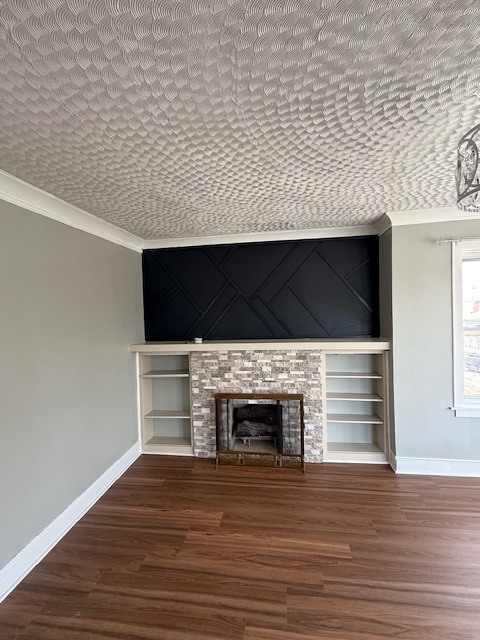 8204 South Elizabeth Street, Unit 2 Chicago, IL 60620 - Photo 3 of 11 a living room with a flat screen tv a fireplace and entryway