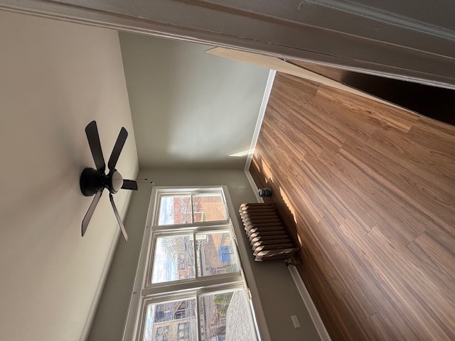8204 South Elizabeth Street, Unit 2 Chicago, IL 60620 - Photo 8 of 11 a view of staircase with white walls and a window