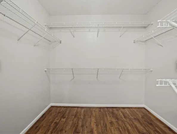 a view of a room with racks on the wall