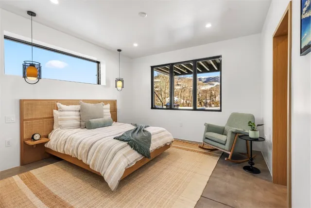 a kitchen with a stove and a refrigerator