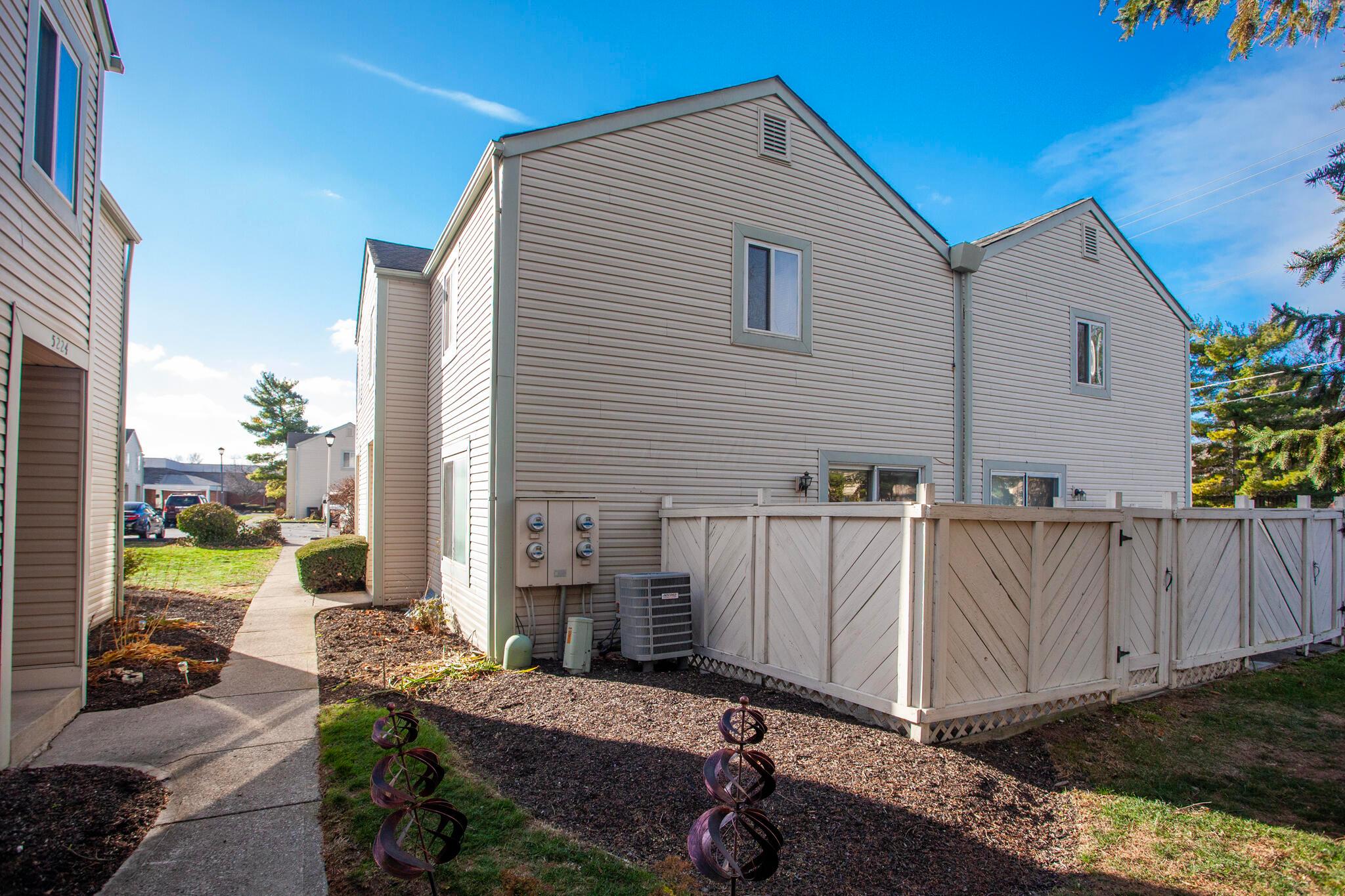 5222 Dierker Road, Unit D Columbus, OH 43220 - Photo 3 of 26 Rear green space and private patio.