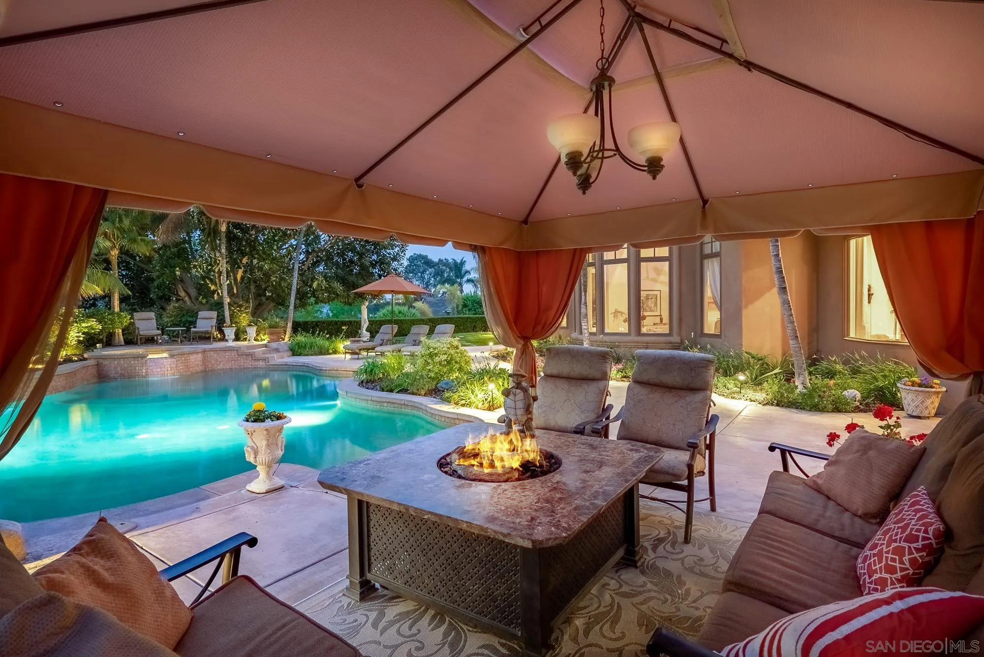 14725 Rancho Santa Fe Farms Road Rancho Santa Fe, CA 92067 - Photo 2 of 50 a outdoor living space with furniture and garden view