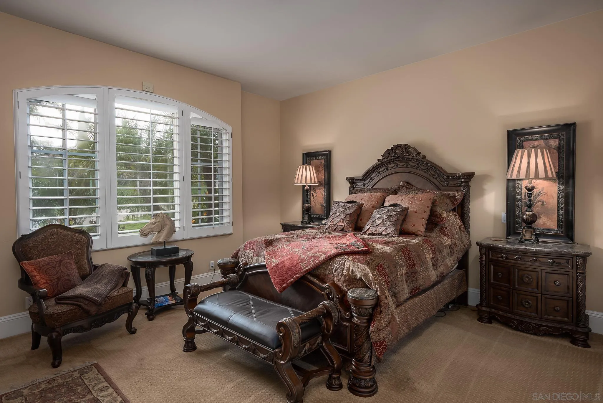 14725 Rancho Santa Fe Farms Road Rancho Santa Fe, CA 92067 - Photo 25 of 50 a bedroom with a bed chair and glass window