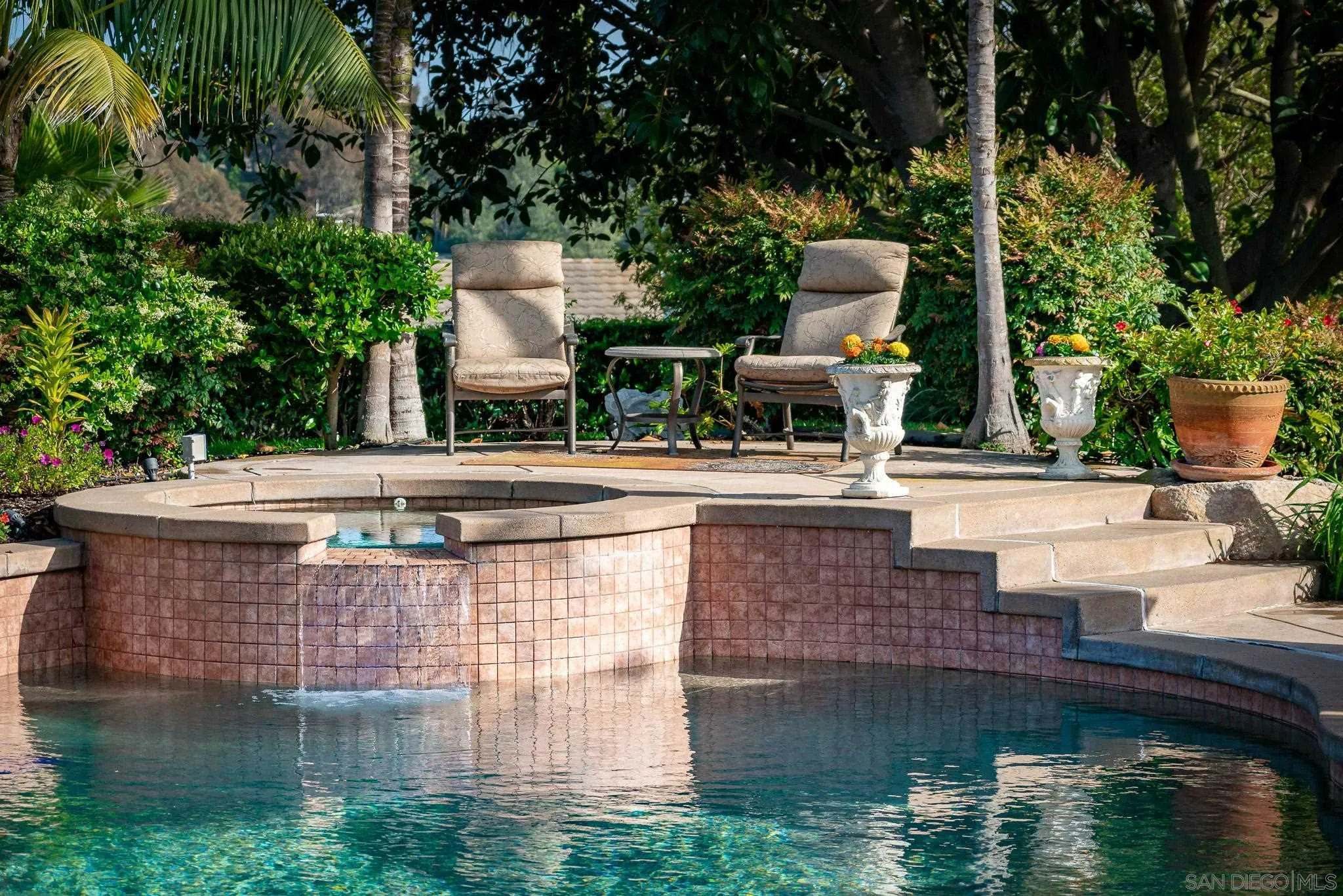 14725 Rancho Santa Fe Farms Road Rancho Santa Fe, CA 92067 - Photo 39 of 50 a view of a swimming pool with a patio