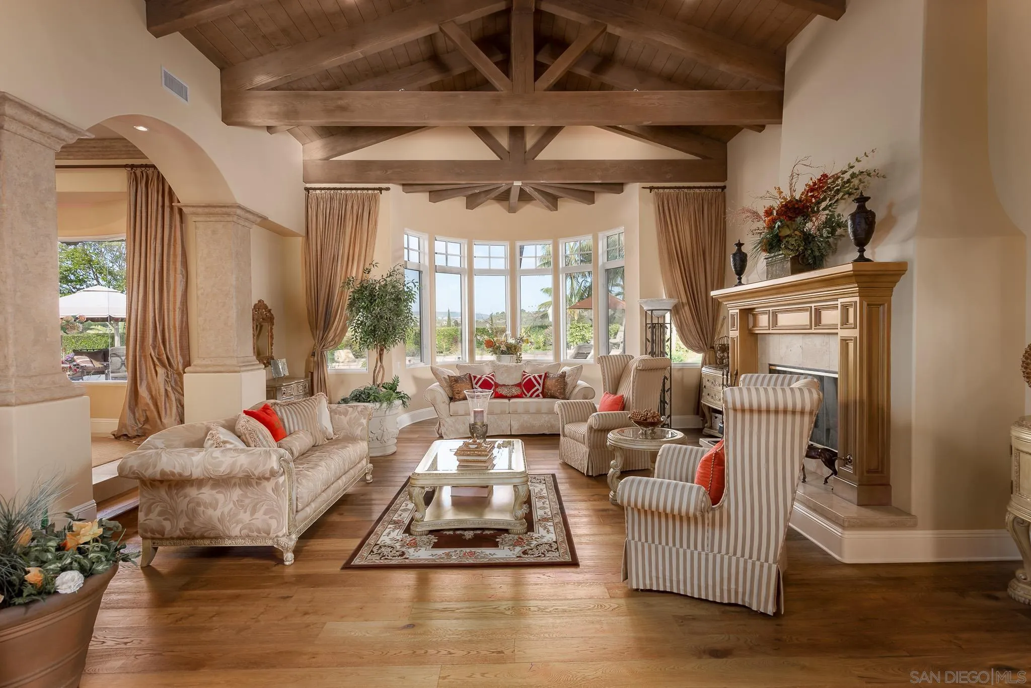 14725 Rancho Santa Fe Farms Road Rancho Santa Fe, CA 92067 - Photo 4 of 50 a living room with furniture and a large window