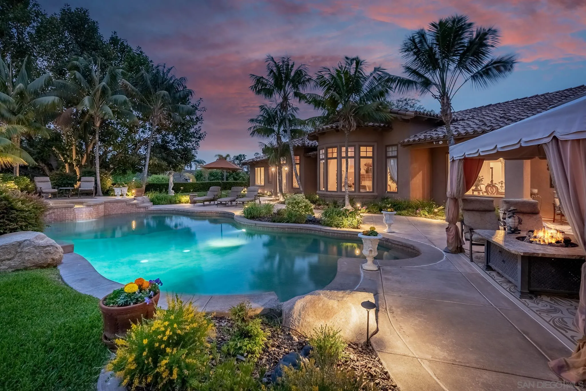 14725 Rancho Santa Fe Farms Road Rancho Santa Fe, CA 92067 - Photo 45 of 50 a view of a swimming pool with a patio