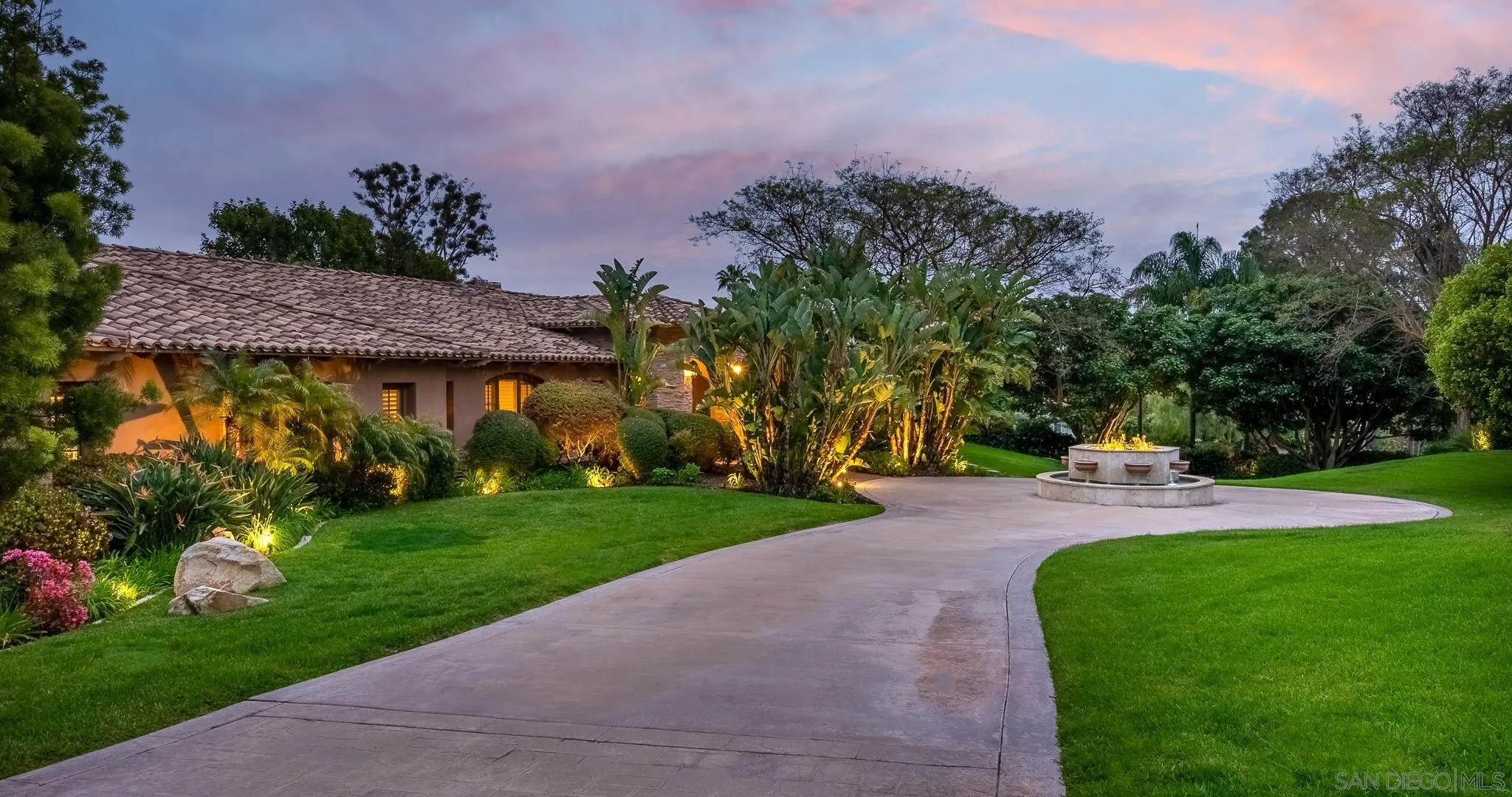 14725 Rancho Santa Fe Farms Road Rancho Santa Fe, CA 92067 - Photo 47 of 50 a view of a garden with a house