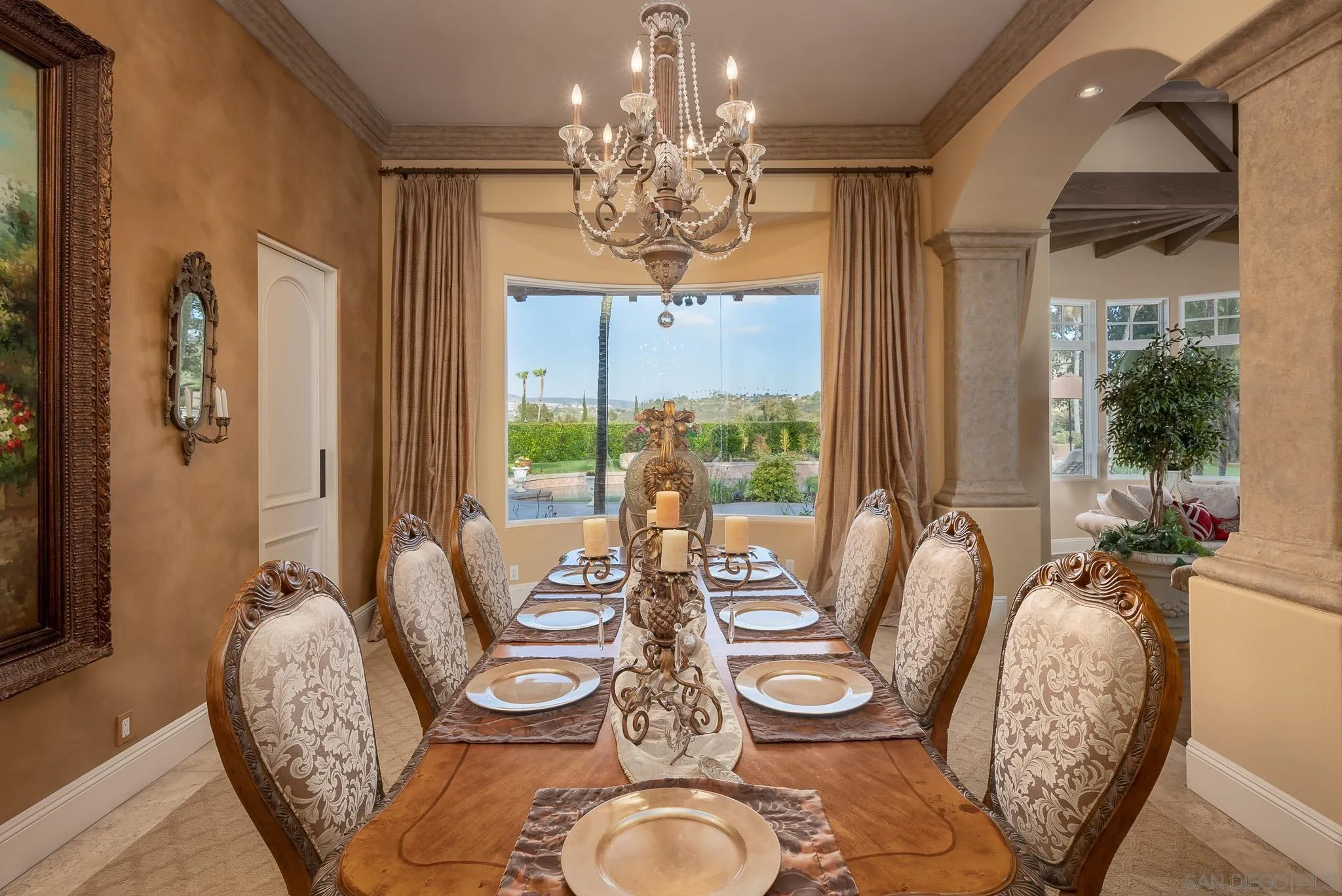 14725 Rancho Santa Fe Farms Road Rancho Santa Fe, CA 92067 - Photo 6 of 50 a view of a dining room with furniture wooden floor and chandelier