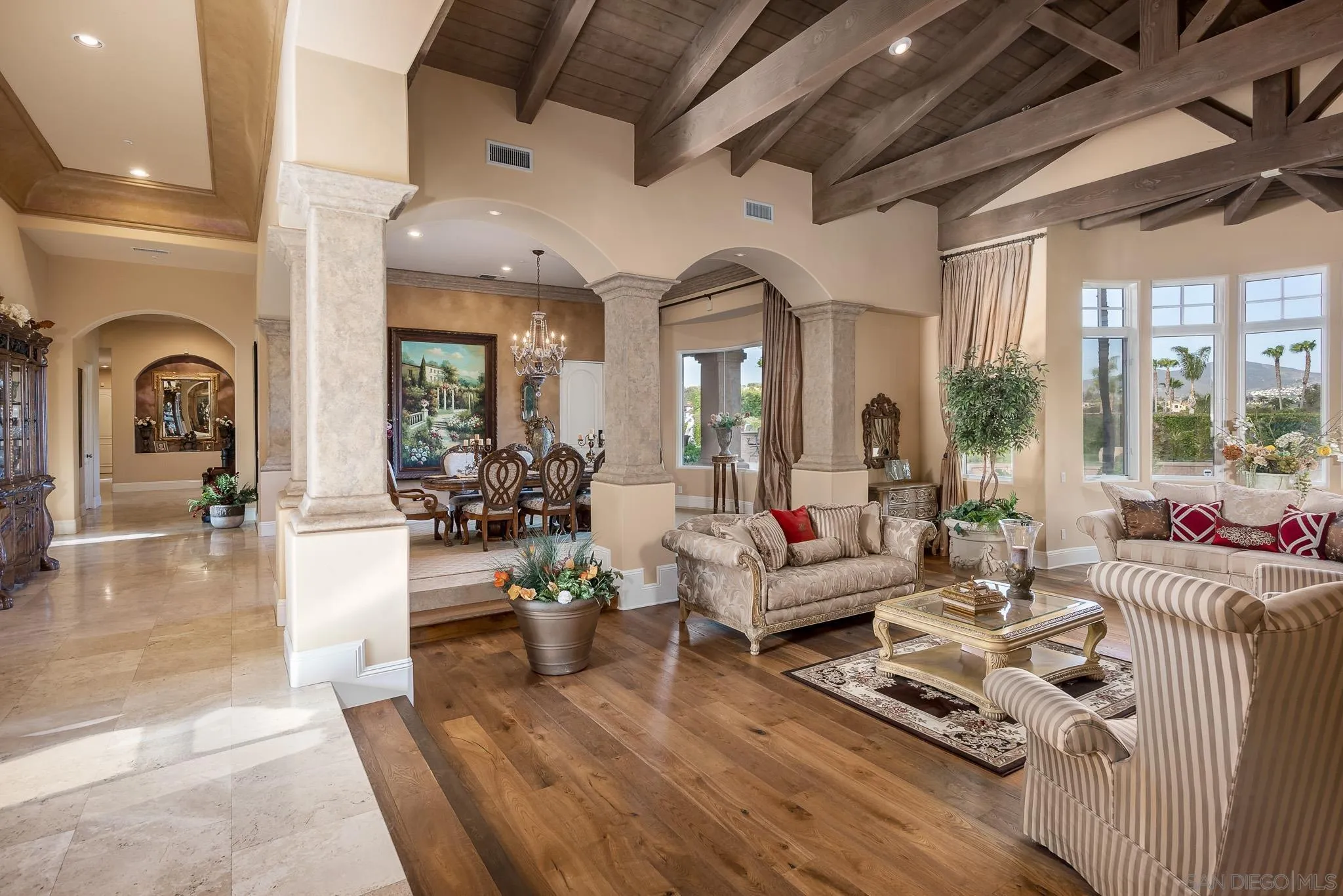 14725 Rancho Santa Fe Farms Road Rancho Santa Fe, CA 92067 - Photo 7 of 50 a living room with furniture and a large window