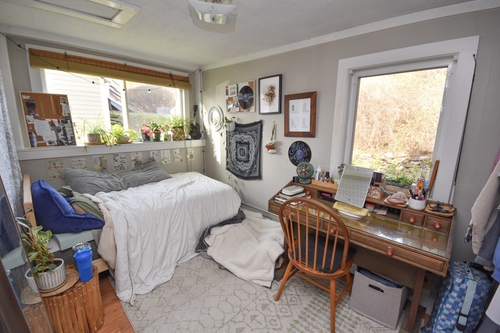35 High Street Amherst, MA 01002 - Photo 23 of 41 a bedroom with two beds and a large window