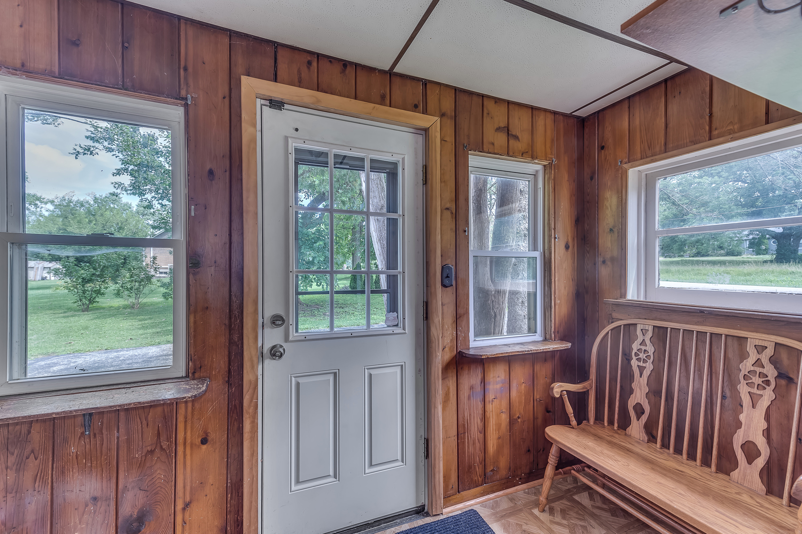 21136 Hillside Road Frankfort, IL 60423 - Photo 3 of 18 a view of a porch with wooden floor and outdoor view