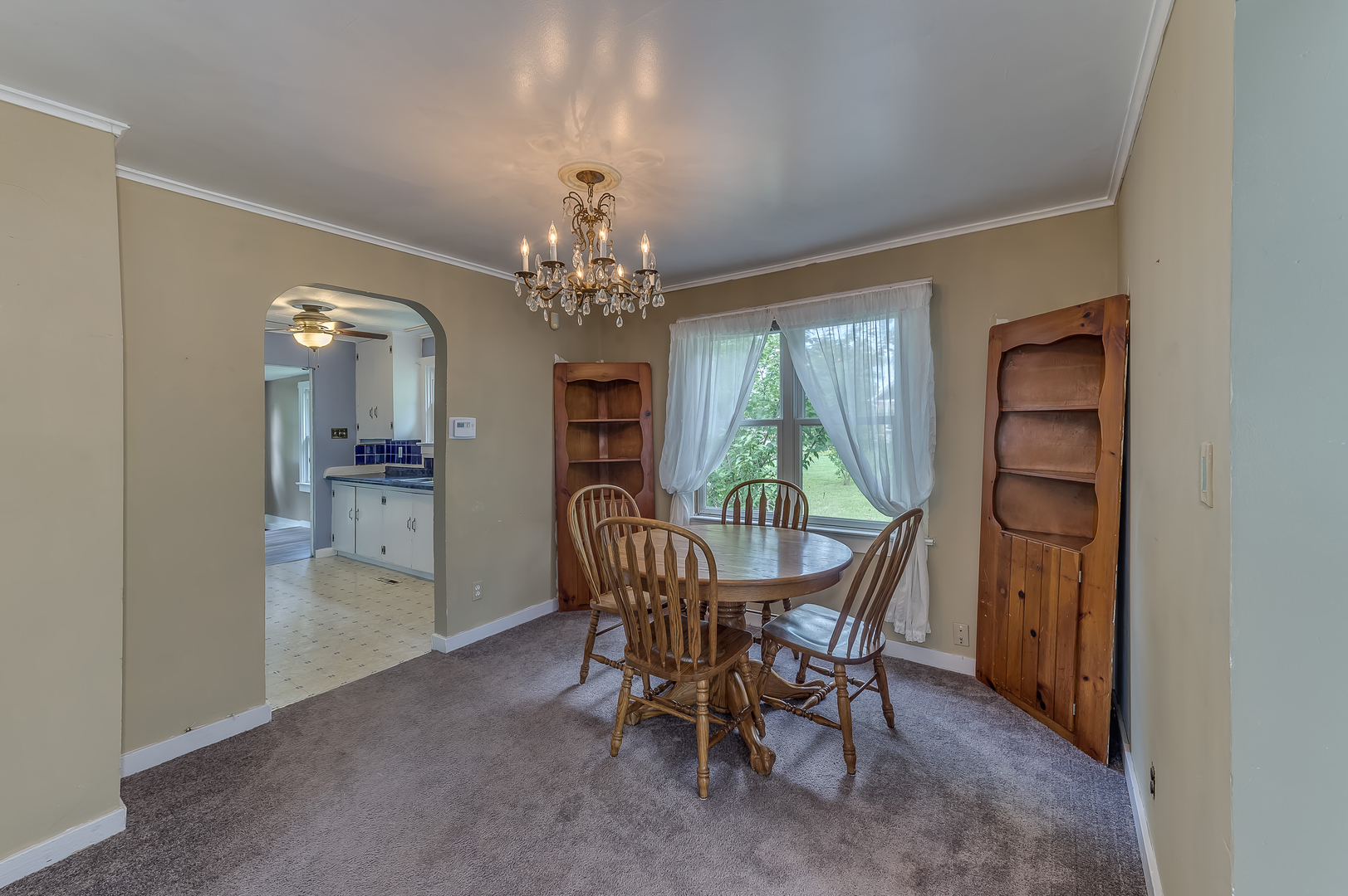 21136 Hillside Road Frankfort, IL 60423 - Photo 8 of 18 a view of a dining room with furniture and chandelier
