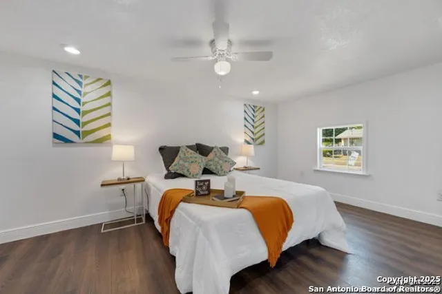 a bed room with a bed and a window