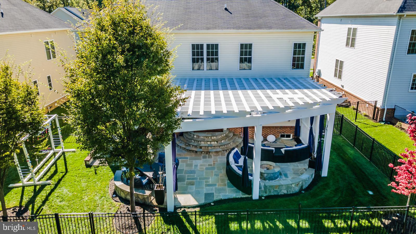 42342 Rising Moon Place Ashburn, VA 20148 - Photo 45 of 70 Showy Stone Patio with Built in Firepit