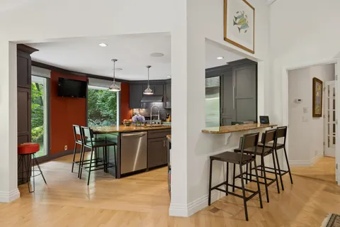 a view of a house with swimming pool