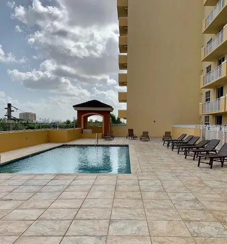 a bathroom with a double vanity sink and mirror