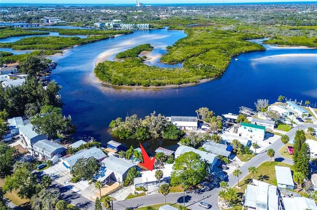 a view of swimming pool with outdoor seating and yard in back