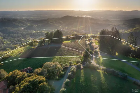 a view of a street with a mountain