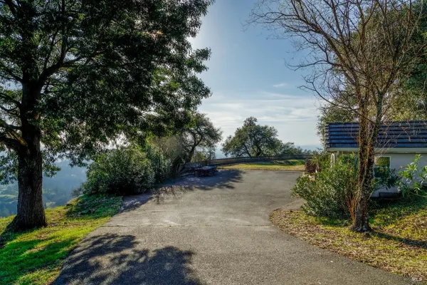 a view of a lake with houses in outdoor space