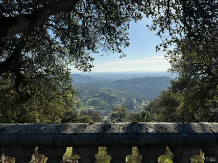 a view of a lake from a balcony