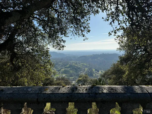 a view of a lake from a balcony