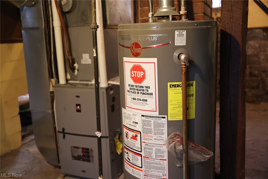 1309 Krumroy Road Akron, OH 44306 - Photo 28 of 30 Utility room featuring water heater