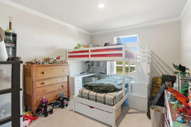 a utility room with dryer washer and a view of living room