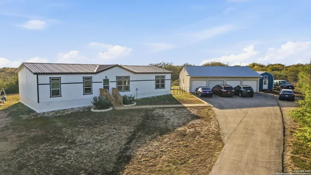 a view of a yard in front of a house