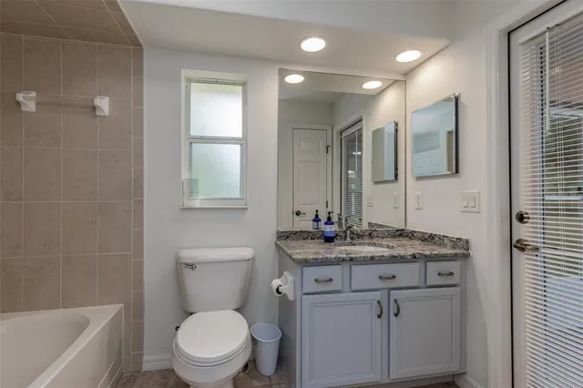 a view of house with outdoor seating yard and furniture