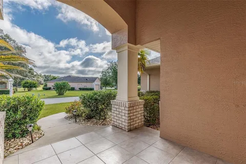 a view of a pathway both side of house