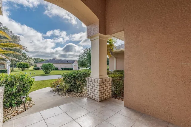 a view of a pathway both side of house