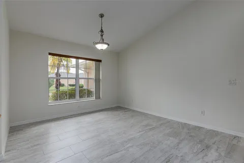 a bathroom with a glass door shower