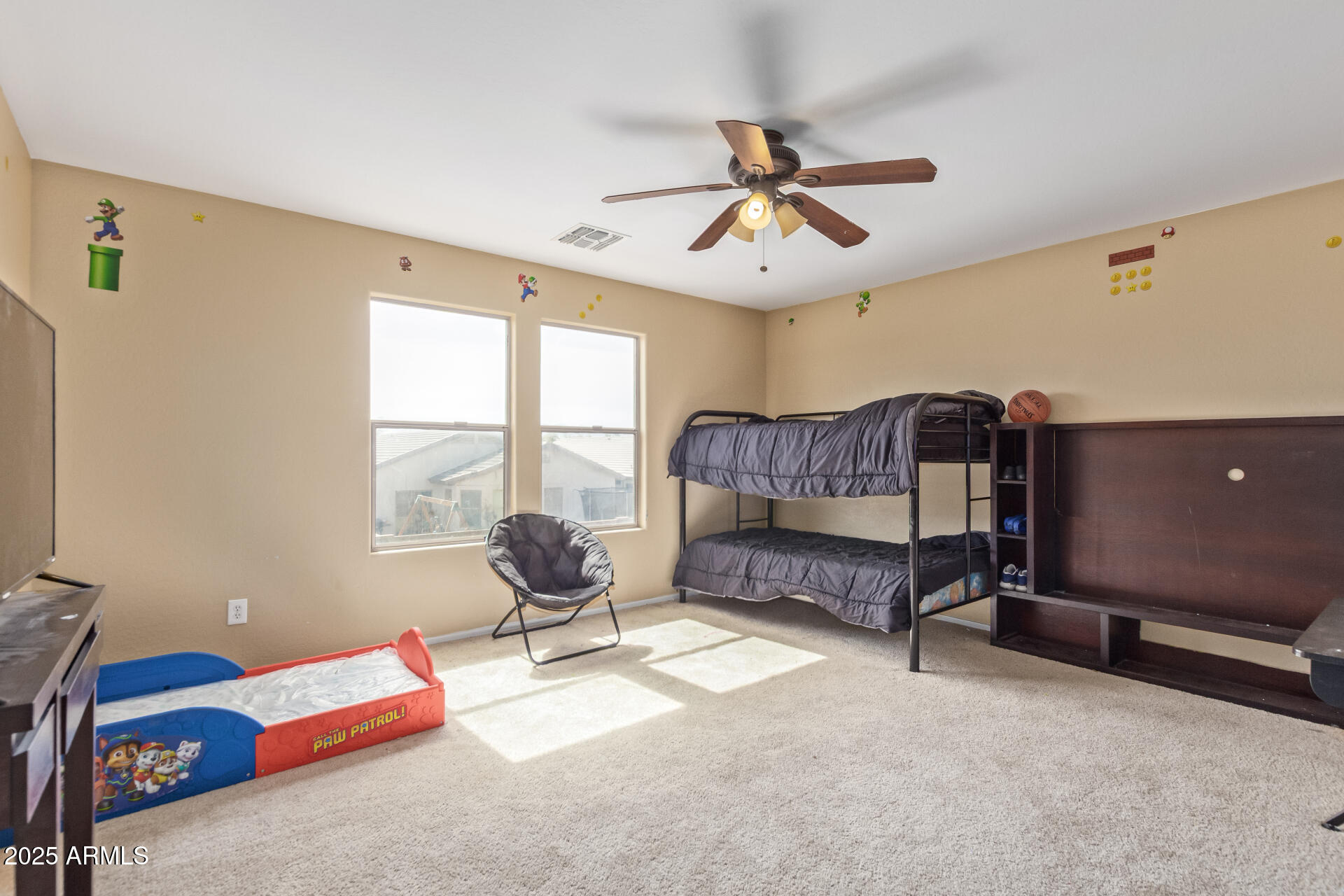 3209 West Apollo Road Phoenix, AZ 85041 - Photo 27 of 40 a living room with furniture a air conditioner vent and a window